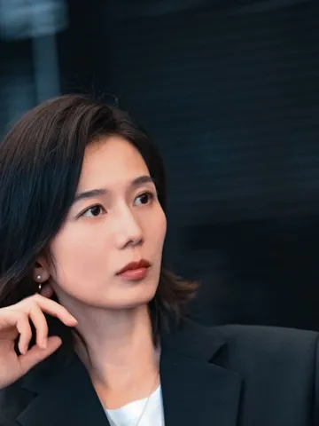 Peng Yang as Liang Xin (Tracy)